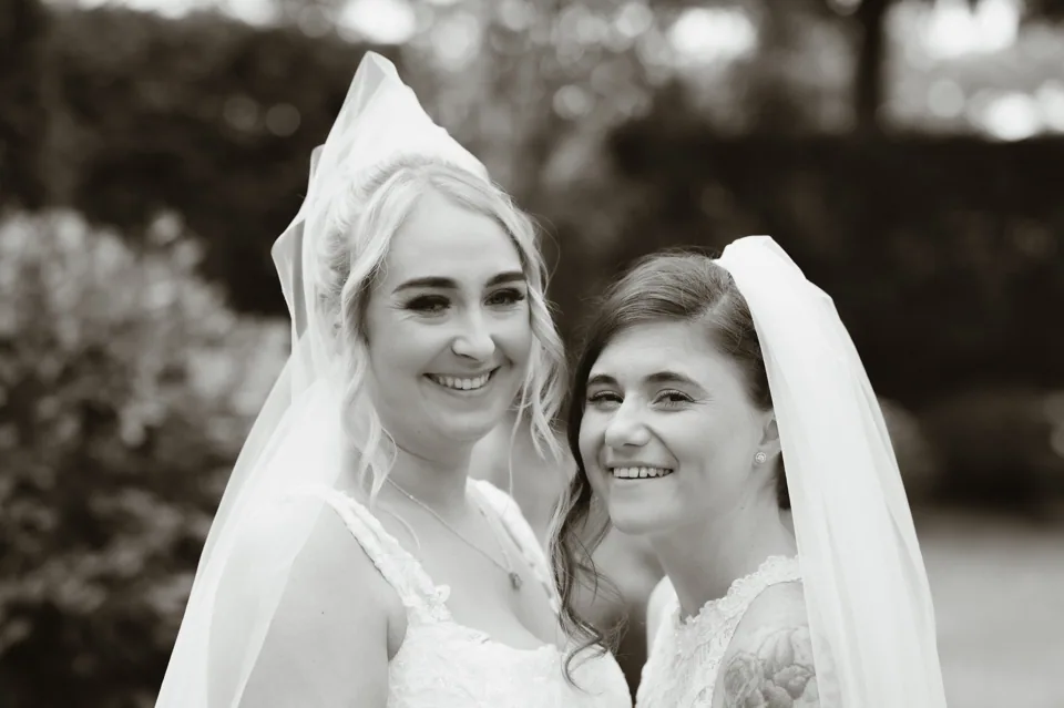 A close portrait of the couple in black and white
