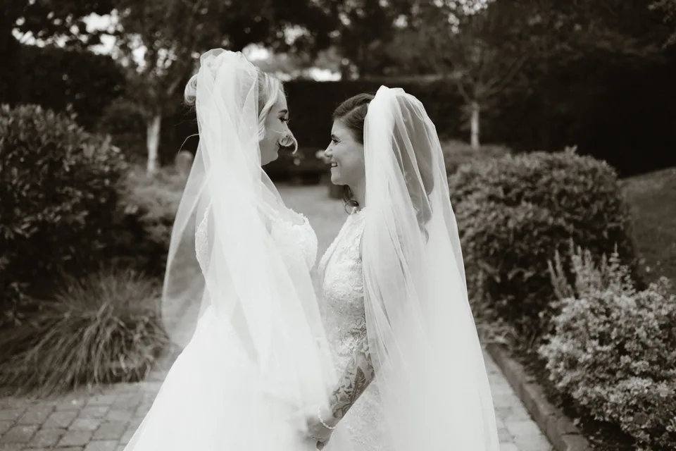 The couple together among the garden trees